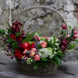 Photo of Arrangement of flowers in the basket «Chic»