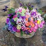 Photo of Luxurious basket with flowers and fruit additions