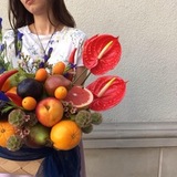 Photo of Men's basket with flowers and fruits