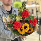 Photo of Interesting bouquet with unusual roses «Flame of Spring»