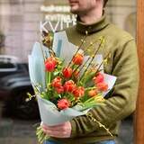 Photo of Bright spring bouquet of tulips and forsythia «Tulip samba»