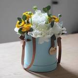 Photo of White Peonies in a Hat Box