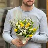 Photo of Spring bouquet of tulips and fragrant genista «Sunshine for you»