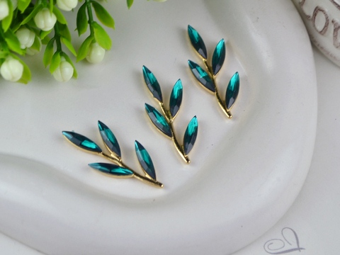 Золота гілочка з камінцями -човниками лазурова