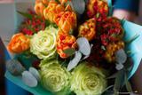 Photo of Bright bouquet with a rose and a jatropha