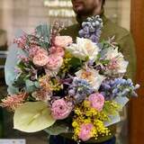 Photo of Bright fragrant bouquet with peony roses, ranunculi and mimosa «Spring days»