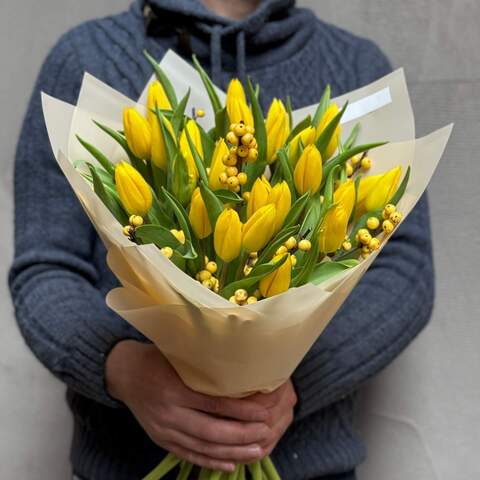 Photo of Bright bouquet with tulips and ilex «Sunny Katrusya»