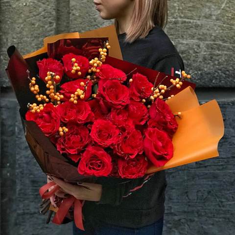 Bouquet «Flames of roses», Bouquet of red roses and yellow ilex in a stylish package