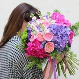 Photo of Bright gift bouquet with hydrangeas and garden roses