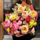 Photo of Light colorful bouquet of peonies, peony-shaped roses, ranunculi and matthiola «Mango aroma»