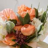 Photo of Composition with salmon Papaverums, Ranunculus and white Hyacinths