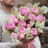 Photo of Fragrant spring bouquet of Sarah Bernhardt peonies and white lilacs «Raspberry parfait»