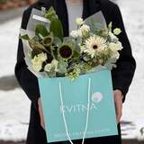 Photo of White and green bouquet with ranunculi and sunflowers «Snowy for Anna»