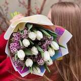 Photo of Delicate bouquet of tulips and chamelaucium «White Shining»