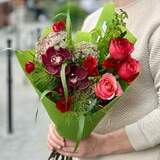 Photo of Rich red and green bouquet «Velvet butterfly»