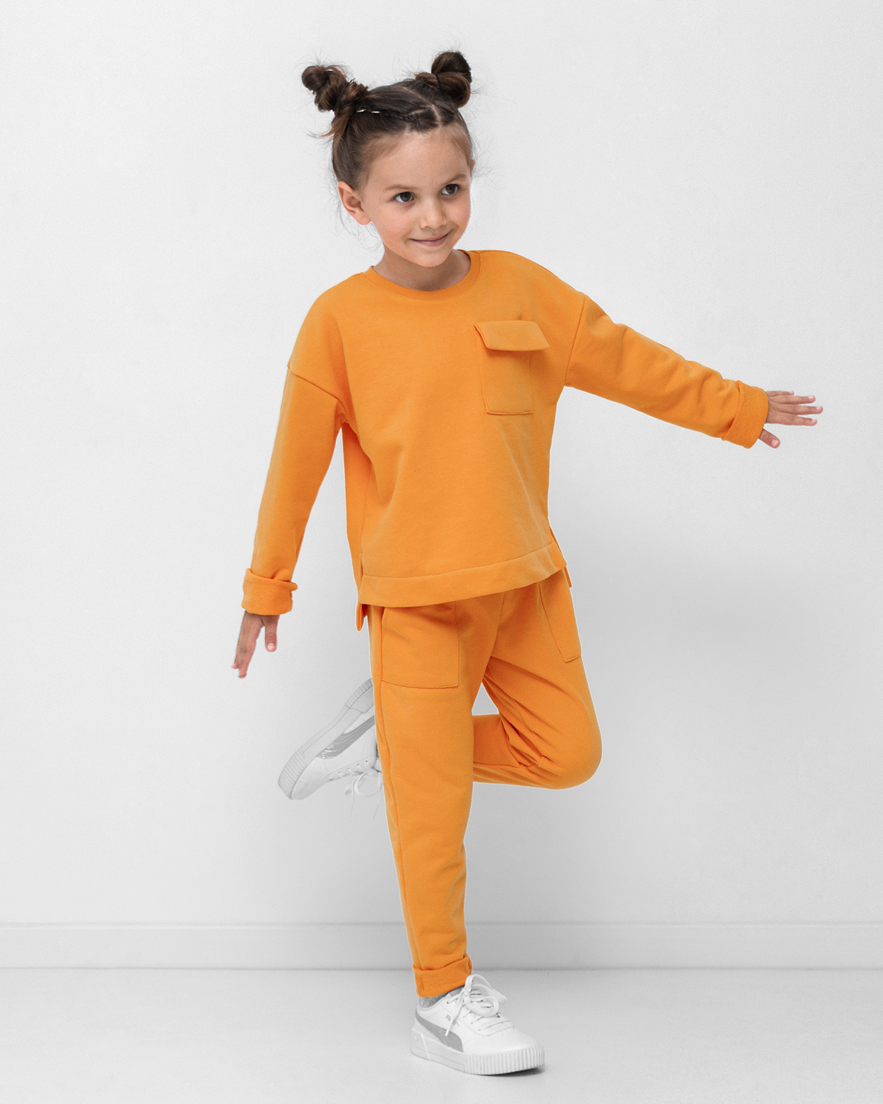 Дитячі спортивні штани з підворотом оранжеві
