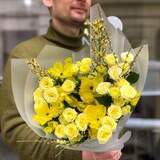 Photo of Bright yellow bouquet of spray roses, ranunculi and genista «Sunny crystal»