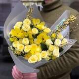 Photo of Bright yellow bouquet of spray roses, ranunculi and genista «Sunny crystal»