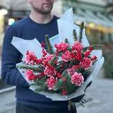 Photo of Red winter bouquet with dianthus and ilex «Caramel cane»