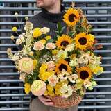 Photo of Basket with flowers «Sunny garden»