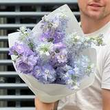 Photo of 11 delphiniums in a bouquet «Curly Sky»