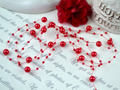 Намистини на волосіні червоні