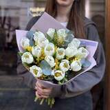 Photo of 17 white tulips and mimosa in a bouquet «Gentle Rays»