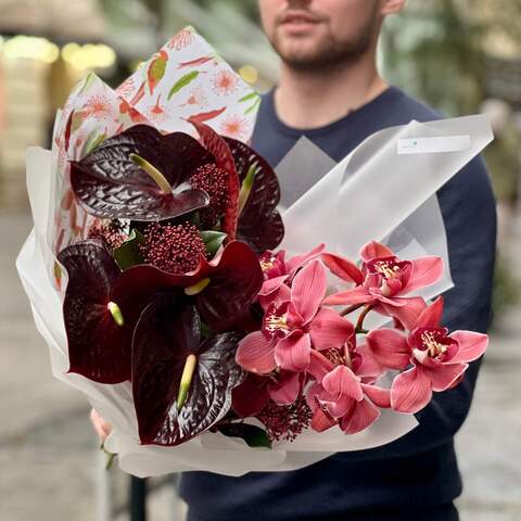 Crimson exotic bouquet with anthuriums and cymbidiums «Winter Ara», Flowers: Anthurium, Cymbidium, Skimmia