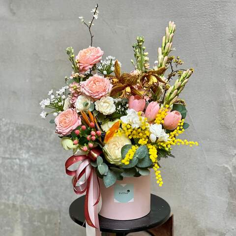 Colorful composition in a box with mimosa and peony roses «Kaleidoscope of Aromas», Flowers: Hypericum, Mimosa, Allium, Dianthus, Strelitzia, Freesia, Tuberosa, Tulipa, Cymbidium, Peony Spray Rose, Bush Rose, Helleborus, Eucalyptus, Pion-shaped rose, Matthiola