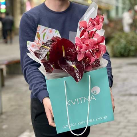 Photo of Crimson exotic bouquet with anthuriums and cymbidiums «Winter Ara»