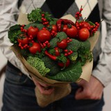 Photo of Bouquet from broccoli, cherry tomatoes and savoy cabbage