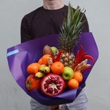 Photo of Bright vitamin bouquet with pineapple and pomegranate