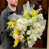 Photo of Fragrant bouquet with mimosa and cymbidiums «Scent of Love»