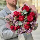 Photo of Interesting bouquet with Red Piano roses and lilacs «Evening Charms»