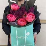Photo of 5 Coral Charm peonies with fragrant lilacs in a bouquet «Luxurious Spring»