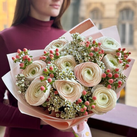 Photo of Sophisticated bouquet with ranunculi and hypericum «Spring Elegance»