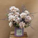 Photo of Pastel composition of exquisite Menta roses and spring genista «Amethyst dust»