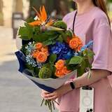 Photo of Constrasting bouquet with strelitzia «Tropical Evening»