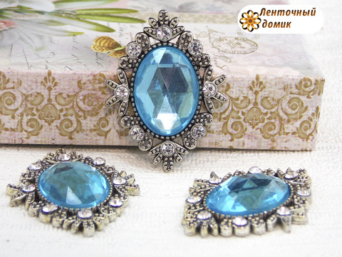 Камни овалы в серебряном ромбовом обрамлении голубые