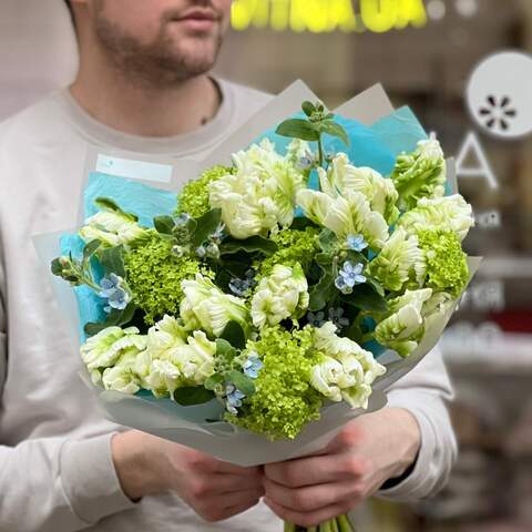 Photo of Spring bouquet of variegated tulips, viburnum and oxypetalum «Green wave»