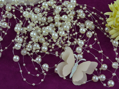 Намистини на волосіні кремові