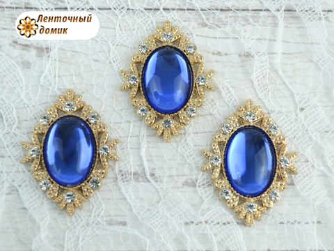 Камни овалы в золотом ромбовом обрамлении зеркальные синие