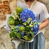 Photo of Interesting bouquet with cynara and hydrangea «Summer Sky»