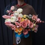 Photo of The composition of tulips, roses and ranunculus 
