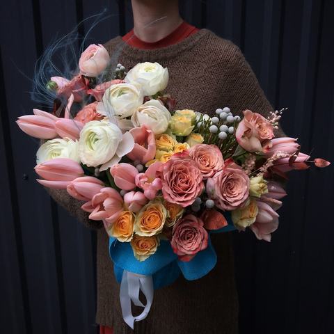 The composition of tulips, roses and ranunculus 