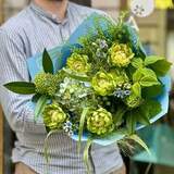 Photo of Green bouquet of peony roses and hypericum «Emerald Sky»
