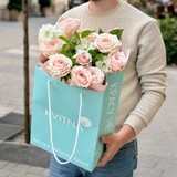 Photo of Tsumugi peony roses in combination with delphinium in a bouquet «Gentle Whim»