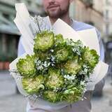 Photo of Green and white bouquet of roses and fragrant genista and oxypetalum «Spring for Nastya»