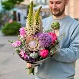 Photo of Exotic bouquet with protea and eremurus «Shine of Orion»