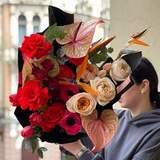 Photo of Incendiary bouquet with exotic flowers and bright classics «Tango for two»